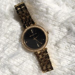 Michael Kors gold women’s wristwatch